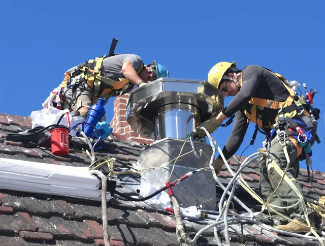 Protective chimney cap installed by Foxborough Chimney Sweep in Foxborough, MA